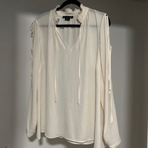 Nice cream blouse with open shoulders that you tie together